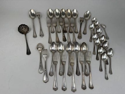 Silver plated tableware set with a leaf motif; the