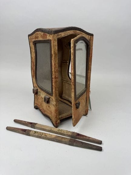 Small display case shaped like a sedan chair, made