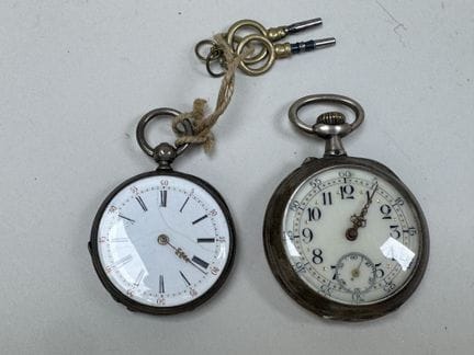 Two silver pocket watches.
19th century.
With smal