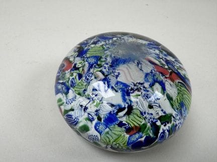 Glass paperweight with polychrome millefiori decor