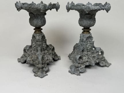 Pair of carved tripod-style pedestals made of regu