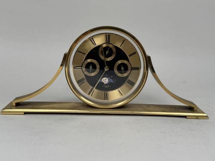 LANCEL in Paris.
Gold-plated metal table clock wit