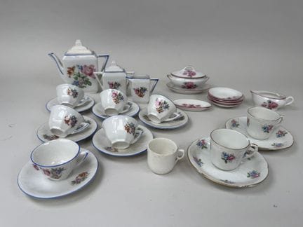 Polychrome porcelain toy kitchen set with floral d