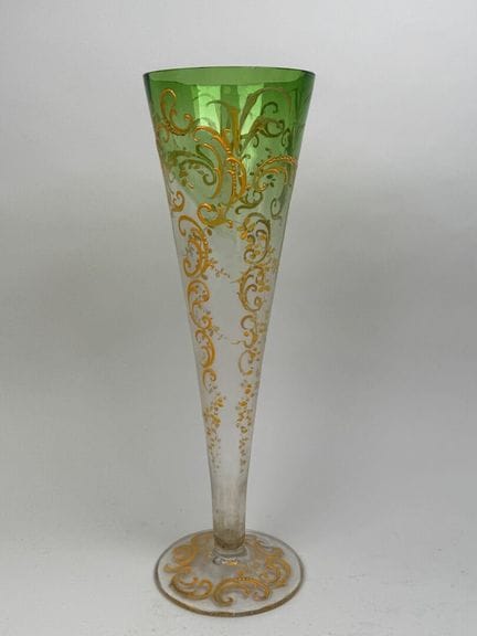 Large, partially colored glass trumpet vase with a