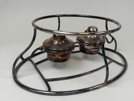 Large, oval-shaped, silver plated metal warming tr
