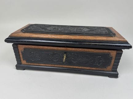 Rectangular box made of pressed wood, decorated wi