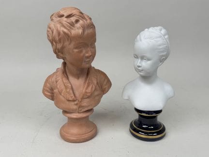 Two busts made of biscuit porcelain and plaster wi