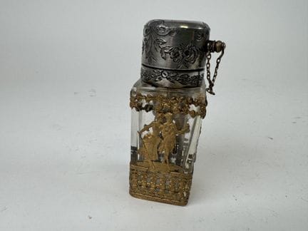 Glass perfume bottle, openwork and chased brass fr