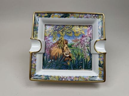 RAYNAUD et Cie. a Limoges.
Leone in un paesaggio.
