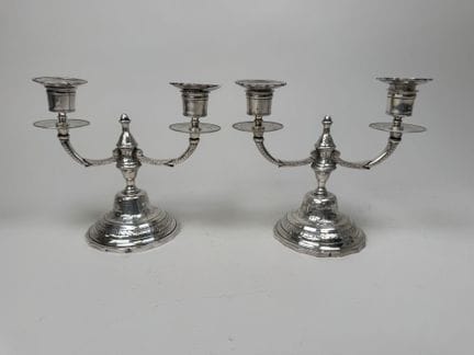 Pair of silver plated metal candlesticks, engraved