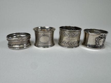 4 Serviettenringe aus 950/1000er Silber, verschied