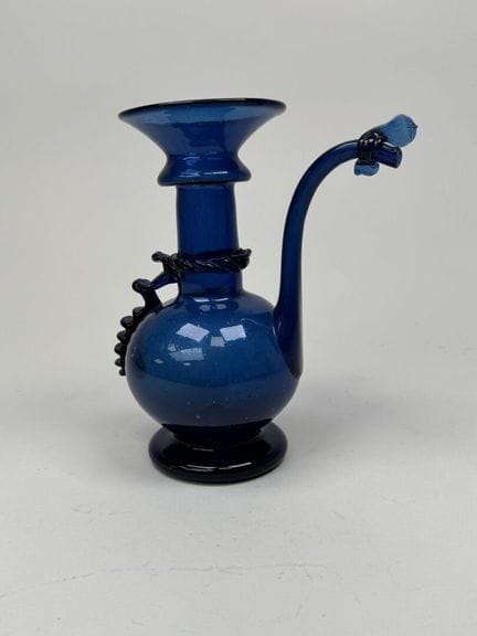 Colored, hand-blown glass flask.
Made using the pi