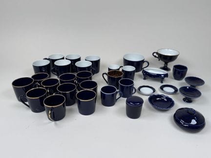 LIMOGES.
A 32-piece collection of blue-and-gold po