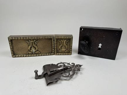 Locks and lock components made of metal and bronze
