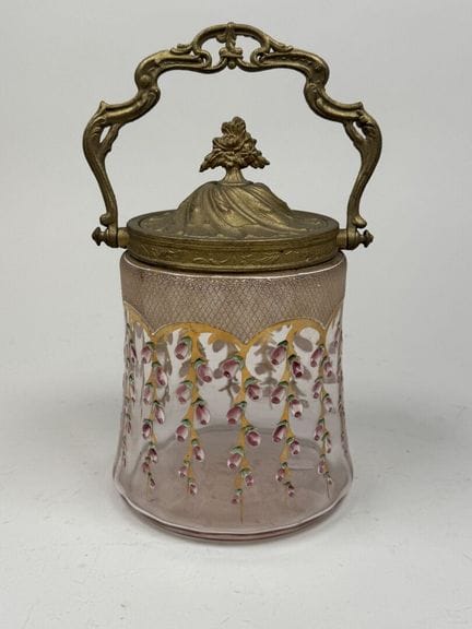 Colored glass cookie jar decorated with an enamele