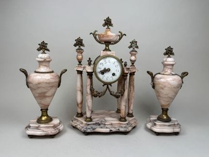 Fireplace ornament in pink marble, bronze, and bra