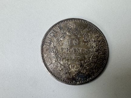 10-Franc-Münze „Herkules“ aus Silber.
Gewicht: 25 