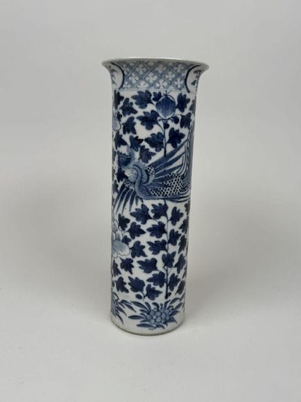 Porcelain cylindrical vase with a blue monochrome 
