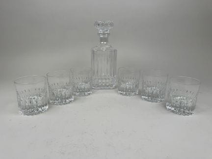 A whisky serving set made of molded and pressed gl