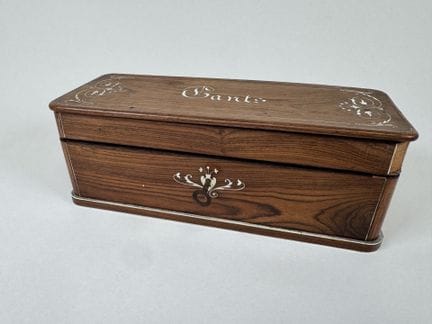 Rectangular glove box made of rosewood veneer and 