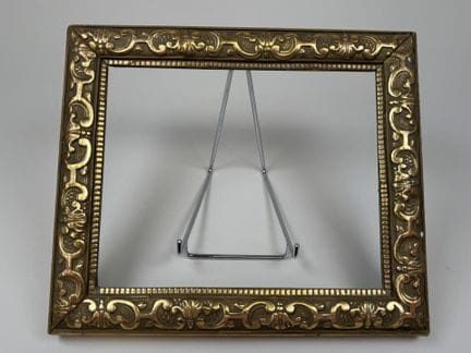 Small wooden frame carved and gilded with stylized