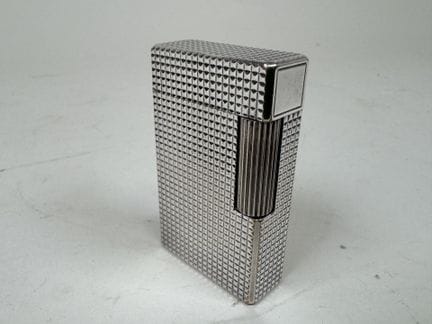 S.T. DUPONT in Paris.
Pocket lighter in silver-pla