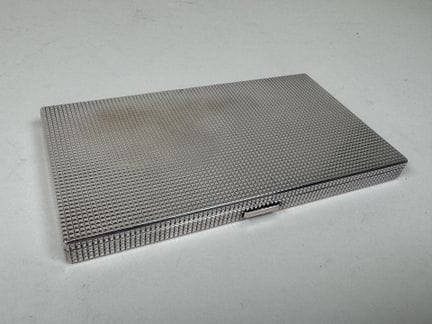 Rectangular silver-plated cigarette case decorated
