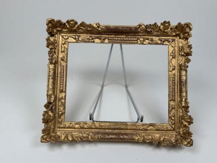 Wooden frame, gilded and carved with small flowers