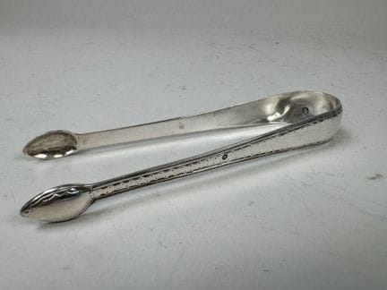 Pinza para azúcar de plata 950/1000, con el sello 