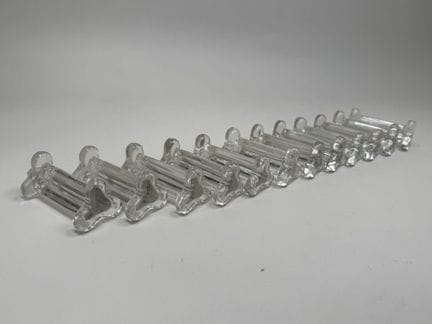 Set aus 12 Messerhaltern aus geformtem und gepress