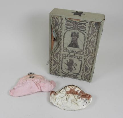 Rectangular key box covered with fabric featuring 