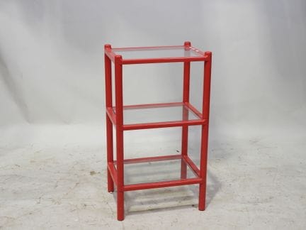 GEDY.
Pequeña mesita auxiliar de formica roja con 
