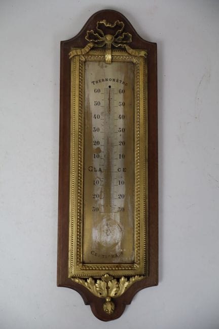 Barometro in legno e bronzo dorato, decorato con u
