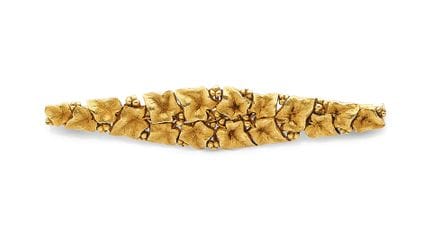Large diamond-shaped brooch in 18K yellow gold (75