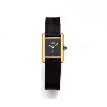CARTIER. 
"Tank Must" wristwatch, rectangular gold