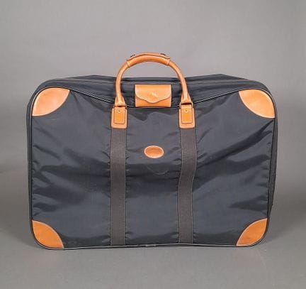 LONGCHAMP, PARÍS.
Maleta blanda con dos asas, conf