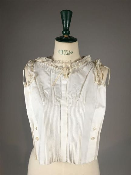 Juego de dos cubrecorsés de algodón blanco ribetea
