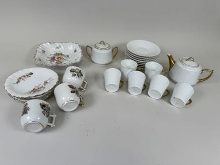 Two coffee service sets in white porcelain with po