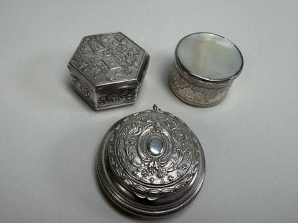 Set of 3 small silver and metal pill boxes: one wi