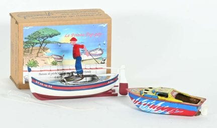VERTIGE.
Pop-pop tin boat, made in France, depicti