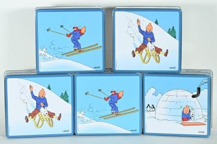 TINTIN IN THE SNOW.
5 empty themed cookie tins.
21