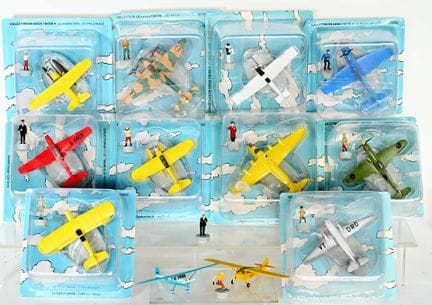 TINTIN in an airplane.
12 metal models with their 