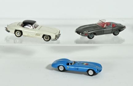 TEKNO.
3 1/43-scale cars, complete, in near-new co