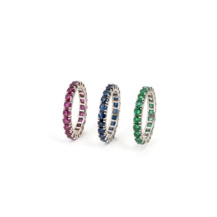 Drei Eternity-Ringe mit Saphiren, Smaragden und Ru