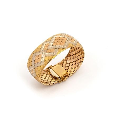 Halbstarres Armband in Bandform.
18-Karat-Gold in 