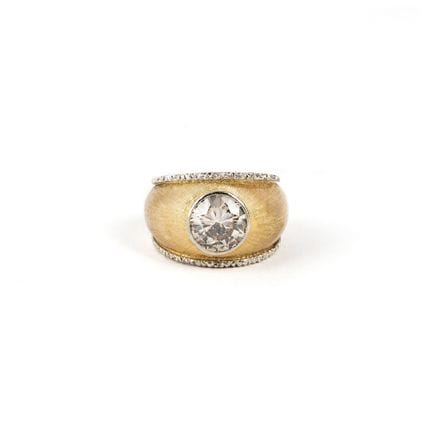 Bandring mit synthetischem Diamanten.
18 Karat Gel