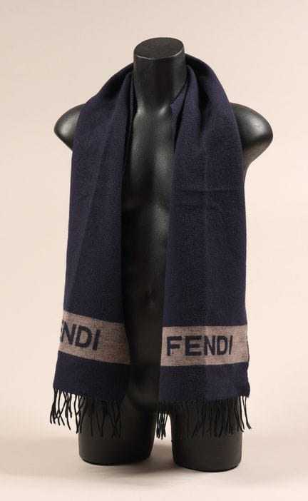 * FENDI
 Navy wool fringed scarf featuring the bei