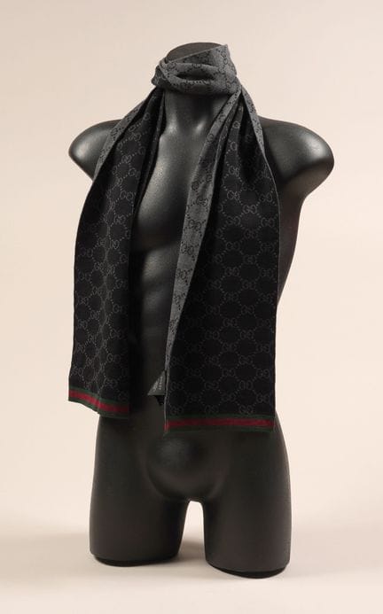 * GUCCI 
Reversible gray and black Supreme GG wove
