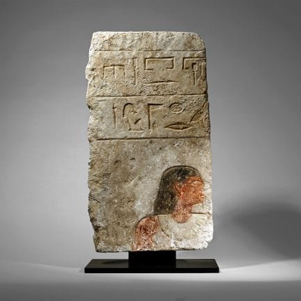 Egyptian Limestone Relief with Painted Head and Hi