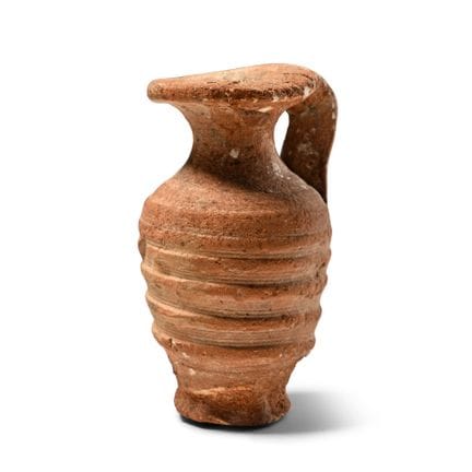 Piccola brocca greca in terracotta rossa con nerva